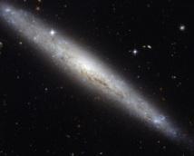 Hubble retrata con todo detalle una polvorienta galaxia espiral
